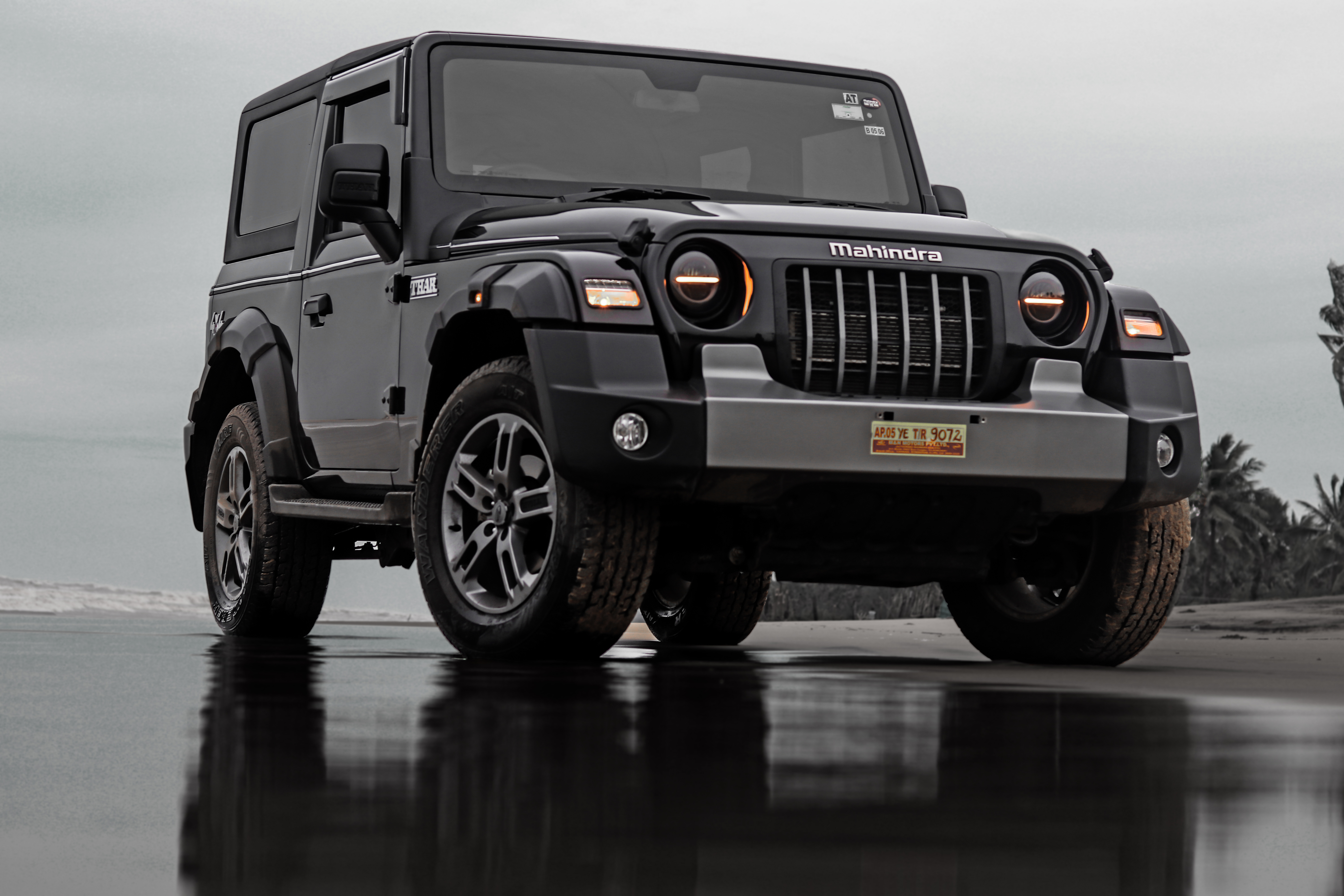 Mahindra Thar parked by the coast — representative model photo